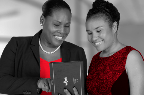 Two women looking at tablet