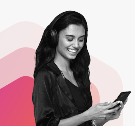 Woman holding mobile phone with headphones