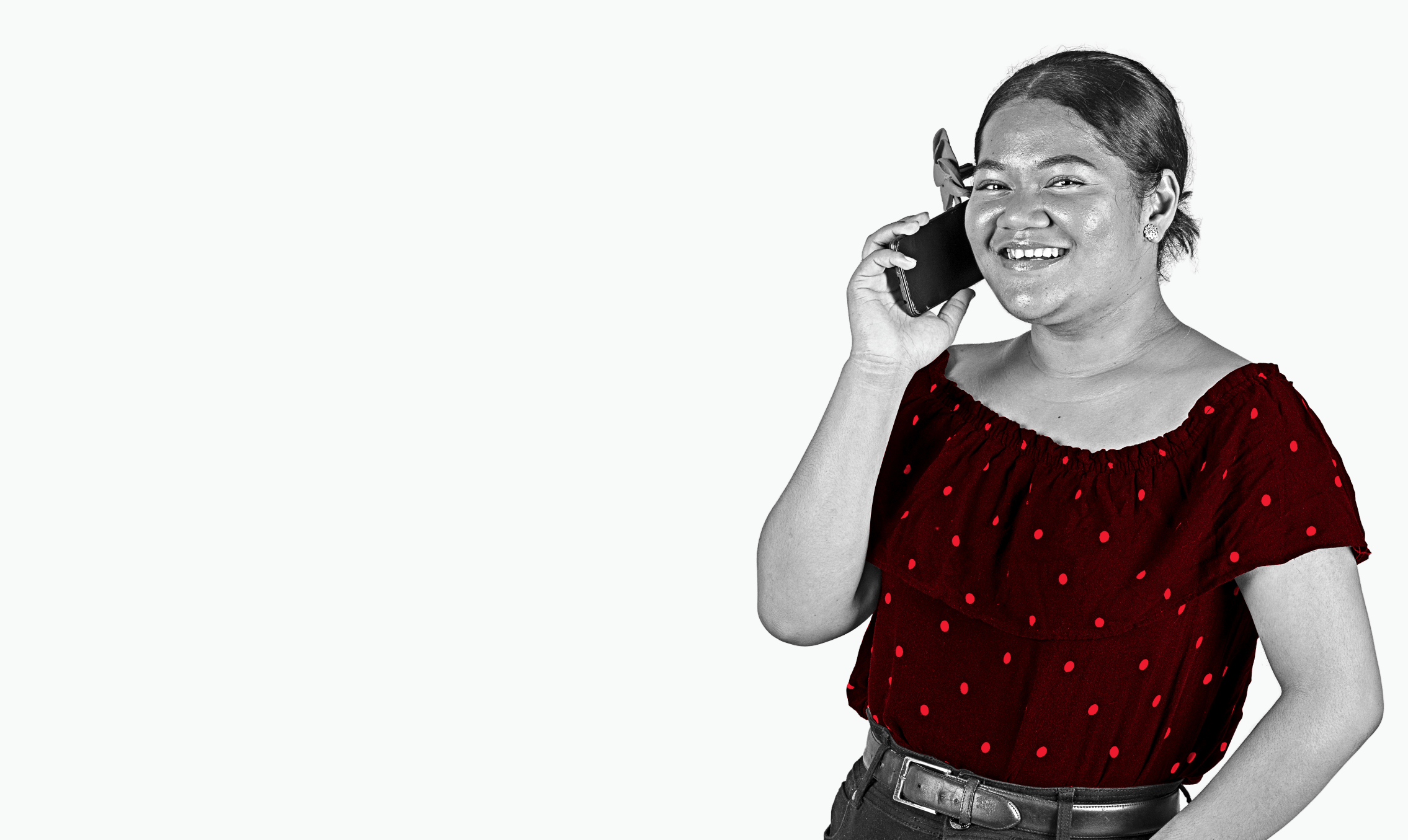 A woman on a phone call, smiling