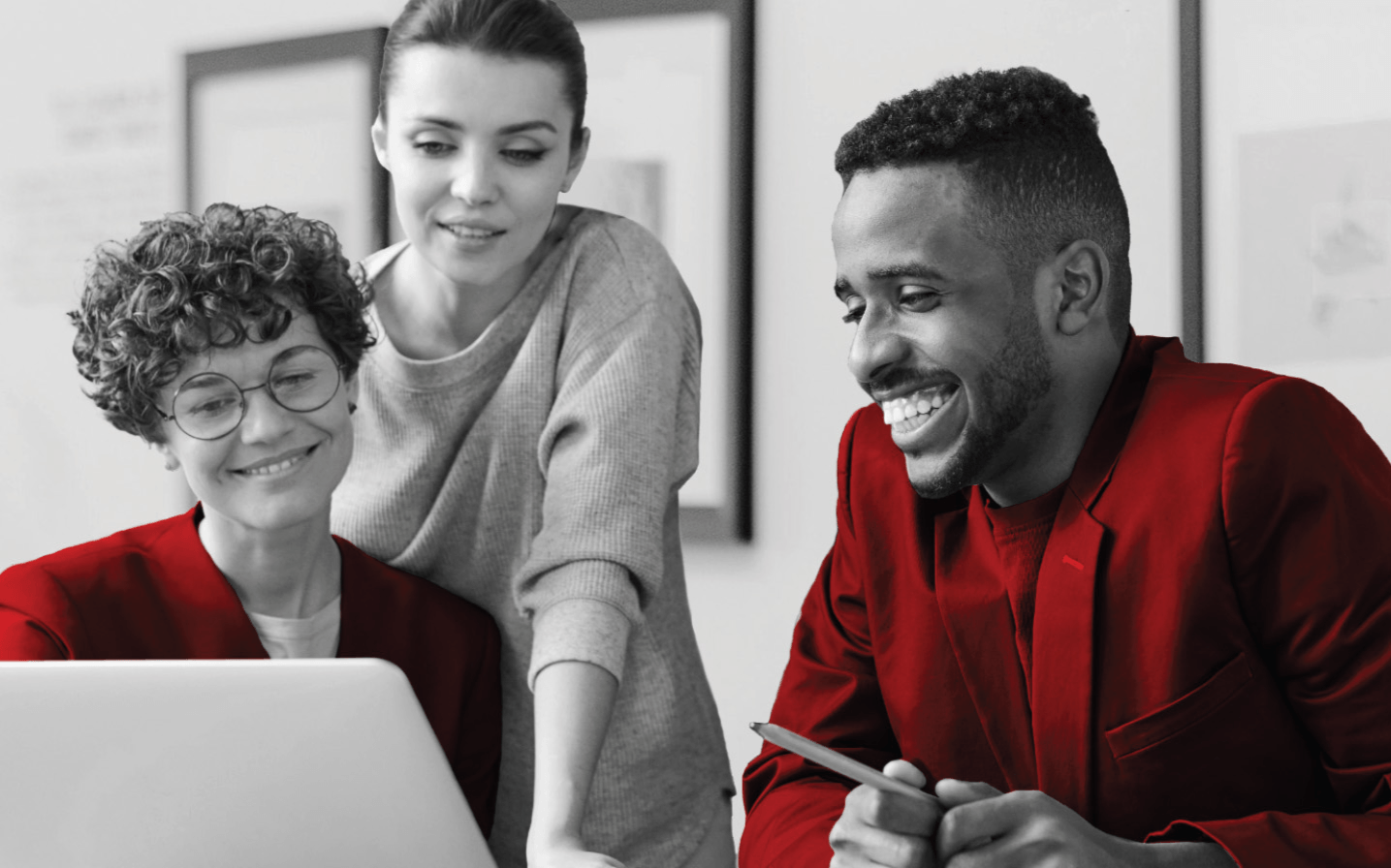 Group of people in front of computer