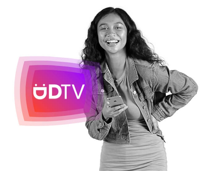 A woman smiling next to the DigicelTV logo