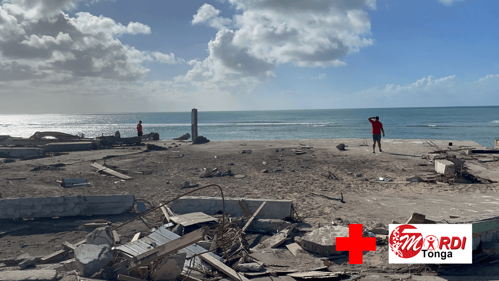 A coastline with buildings damaged by a tsunami